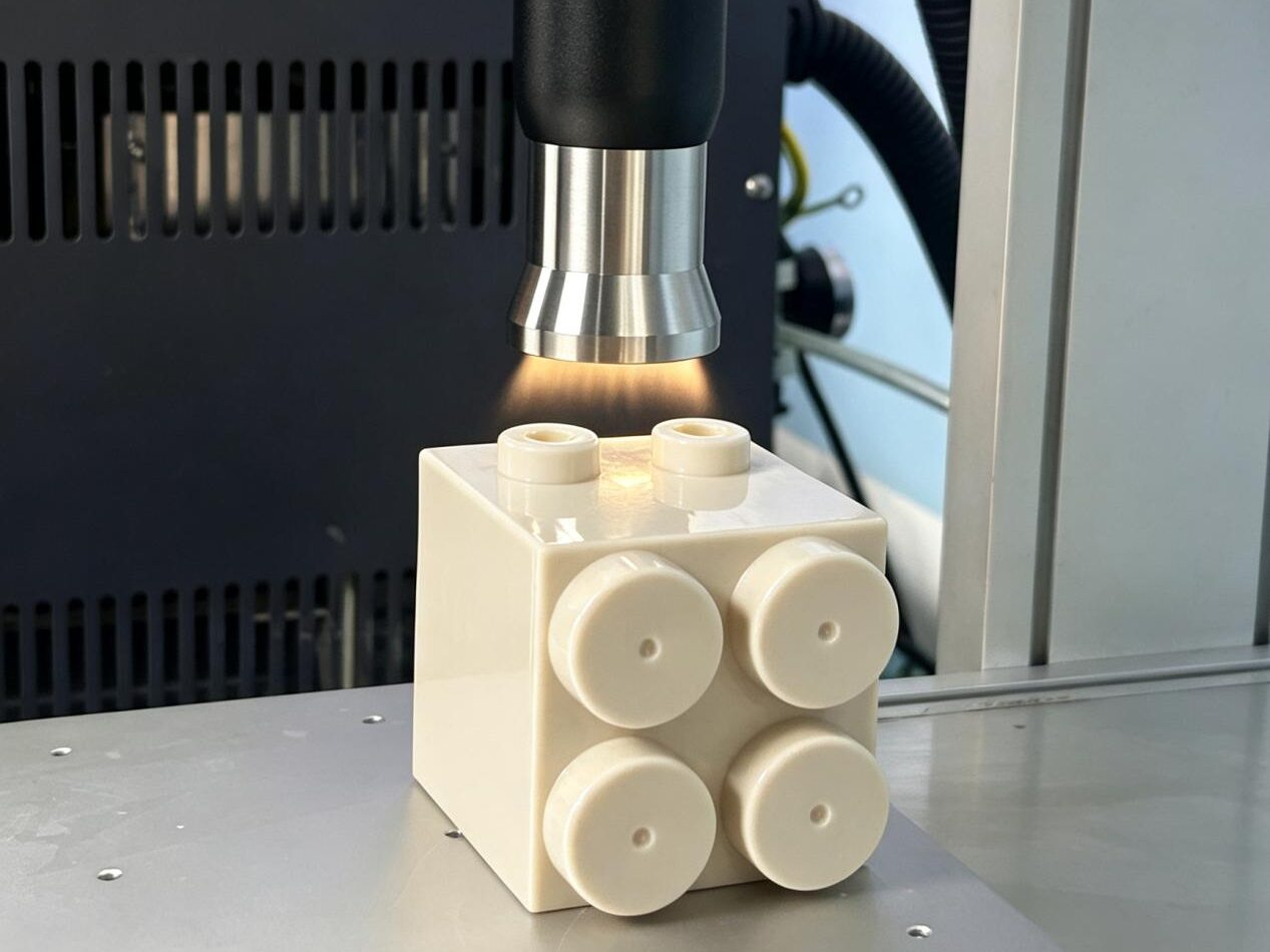 Atmospheric plasma treatment of a polypropylene toy block