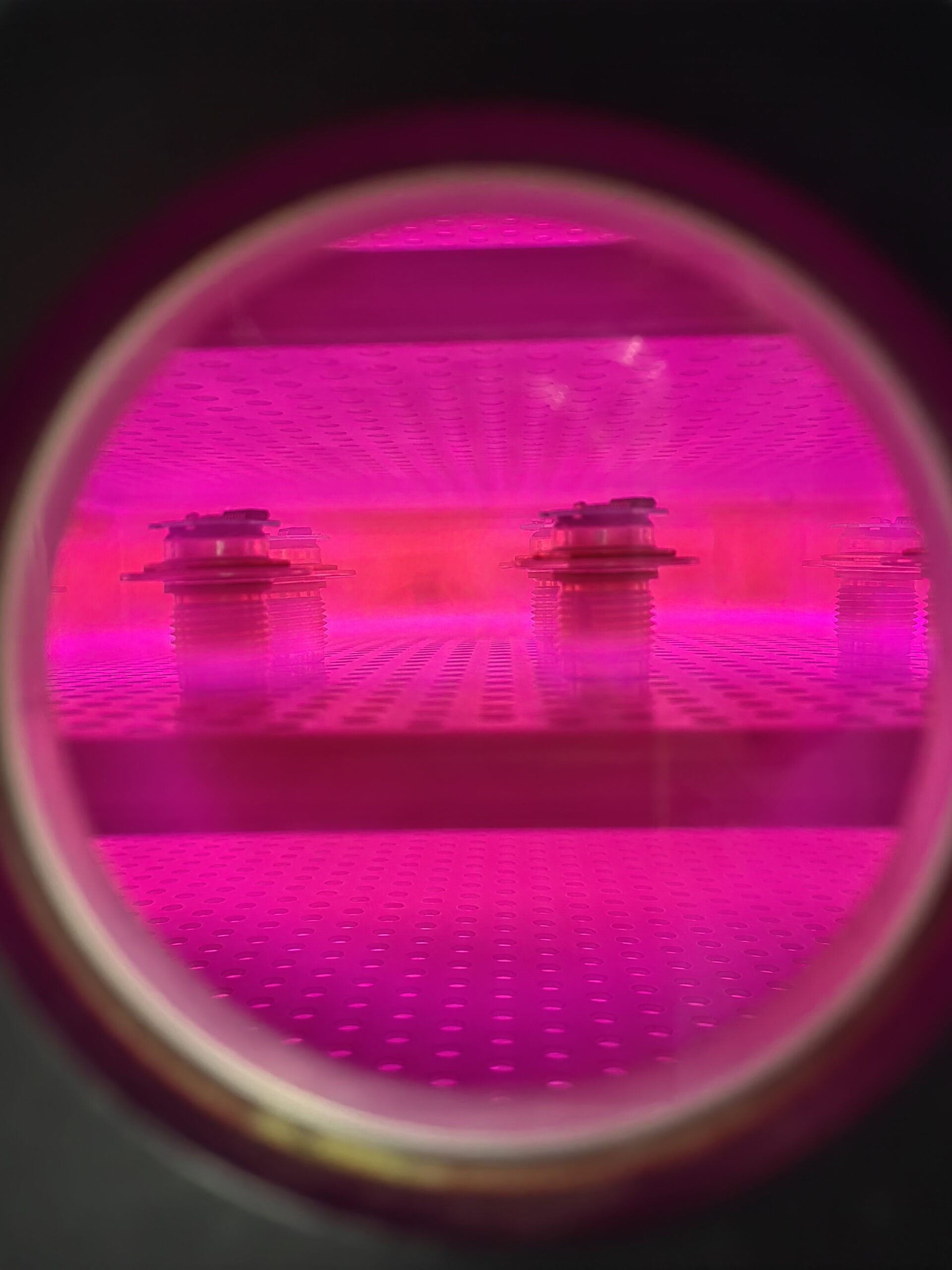 Plasma treatment of aluminum threaded parts in a vacuum chamber